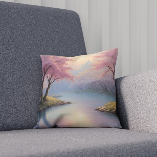 Cushion with a tranquil cherry blossom landscape on sofa