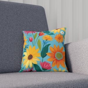 Cushion with bright sunflower and tulip design on teal background on sofa