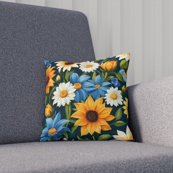 Cushion with blue summer flowers and sunflower design on sofa