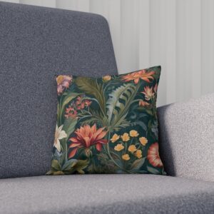 Cushion with a tropical botanical print in rich dark tones