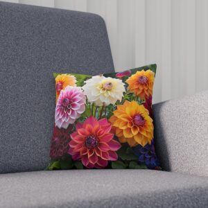 Colorful dahlia flowers cushion on a dark green background