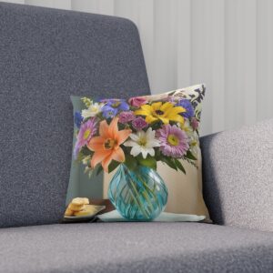 Cushion featuring a colorful floral arrangement in a teal vase