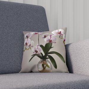 Cushion depicting an orchid in a glass vase on a beige background