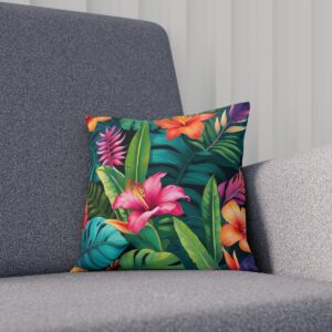 Cushion featuring lush tropical flowers in bold colors on sofa