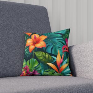 Bright tropical plant and flower design cushion on sofa