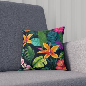 Dark tropical themed cushion with vibrant flowers and leaves