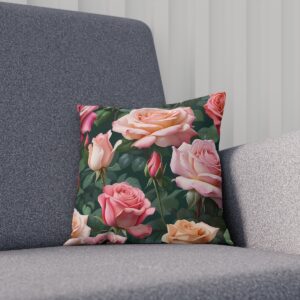 Cushion with full bloom roses in shades of pink and peach