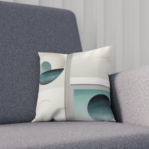 Abstract aqua green geometric design cushion on sofa