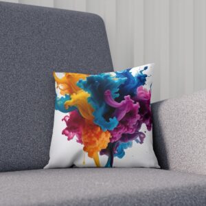 Cushion with colorful ink explosion design on a gray chair