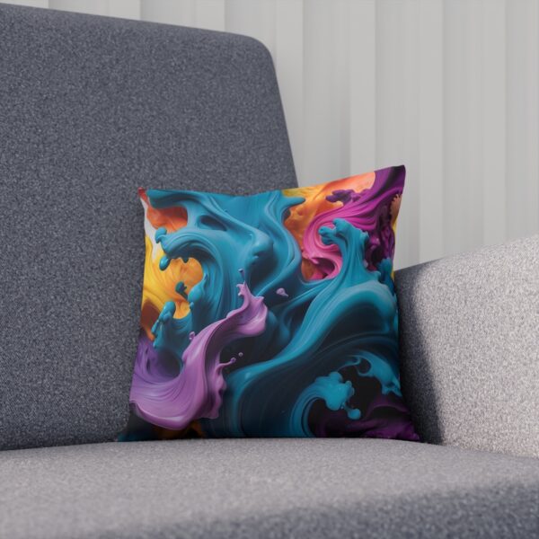 Whimsical cushion with swirling teal and magenta ink pattern on chair