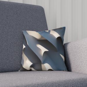 Cushion with abstract blue and cream wave design on a gray chair