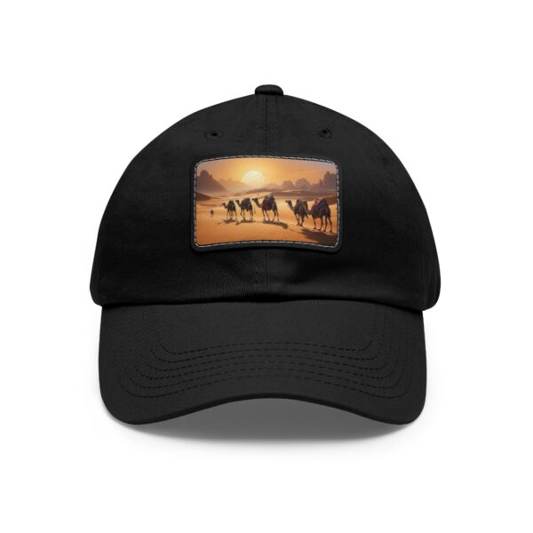 Dad Hat with rectangular patch depicting a camel caravan walking through a desert at sunset