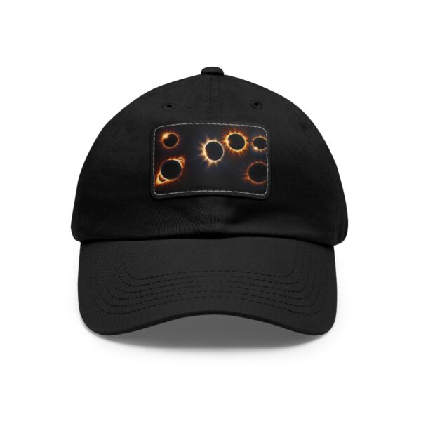 Dad Hat with stitched patch featuring a cosmic design of solar eclipses with glowing rings.