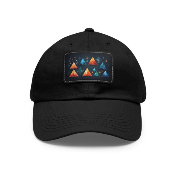 Dad Hat with stitched patch featuring a colorful geometric pattern of small triangles in shades of blue, orange, and red.