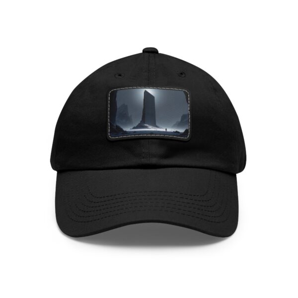 Dad Hat with stitched patch featuring a tall monument silhouette against a misty moonlit night.