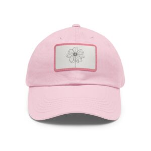 Dad Hat with stitched patch featuring a minimalist line drawing of a daisy-like flower.