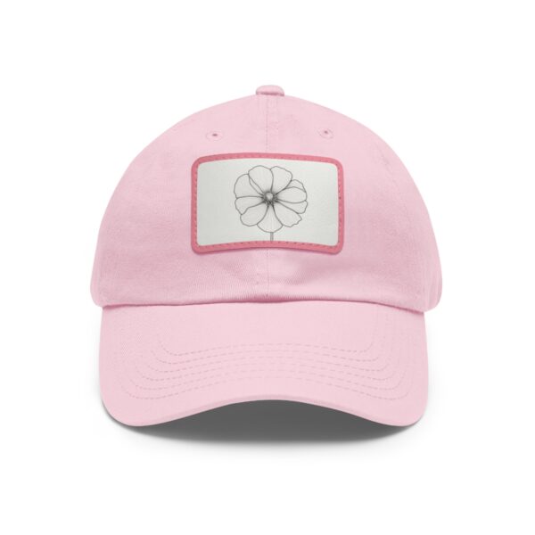 Dad Hat with stitched patch featuring a minimalist line drawing of a geometric flower.