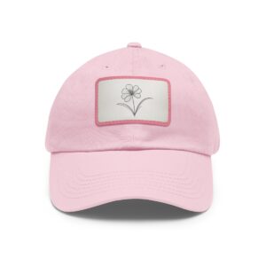 Dad Hat with stitched patch featuring a minimalist line drawing of a single flower.