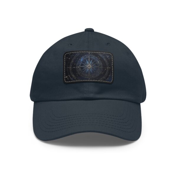 Dad Hat featuring a compass with a galaxy background patch, symbolizing cosmic exploration and direction.