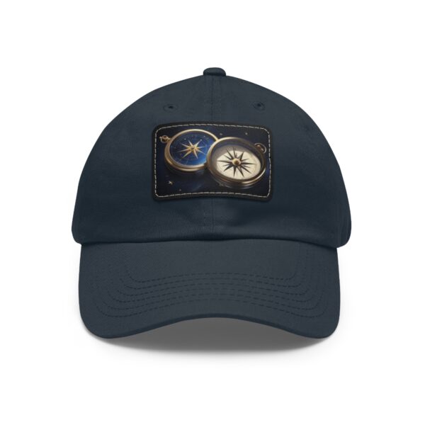 Dad Hat with Leather Patch featuring a design of two compasses, one in blue and one in white, displayed on the front.