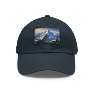 Navy dad hat with a vibrant mountain reflection on a leather patch.