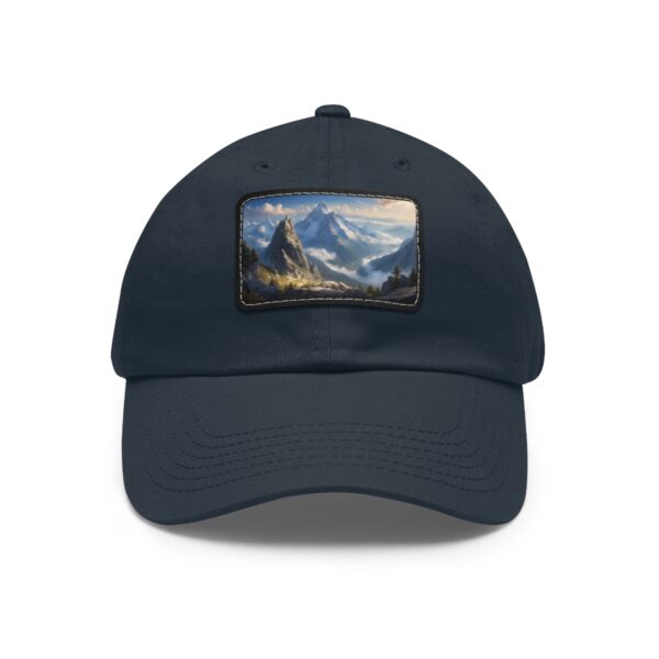 Navy dad hat featuring a dynamic mountain and stormy sky on a leather patch.