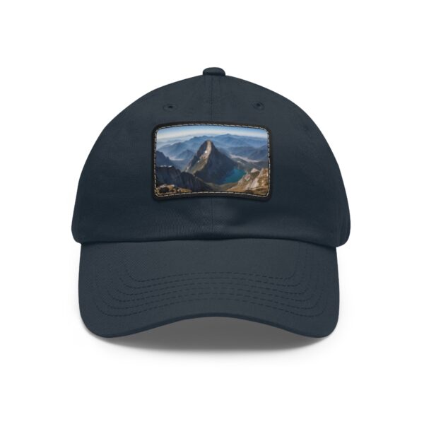 Navy dad hat featuring a leather patch with a vivid mountain and lake view.