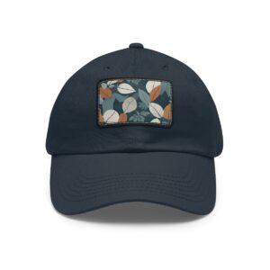 Dad Hat with stitched patch featuring a leaf pattern in shades of green, white, and orange.