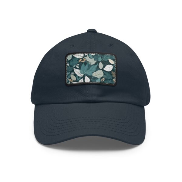 Dad Hat with stitched patch featuring a detailed leaf pattern in various shades of green and white.