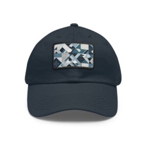 Dad Hat with stitched patch featuring a geometric pattern of overlapping triangles and rectangles in shades of blue, white, and gray.