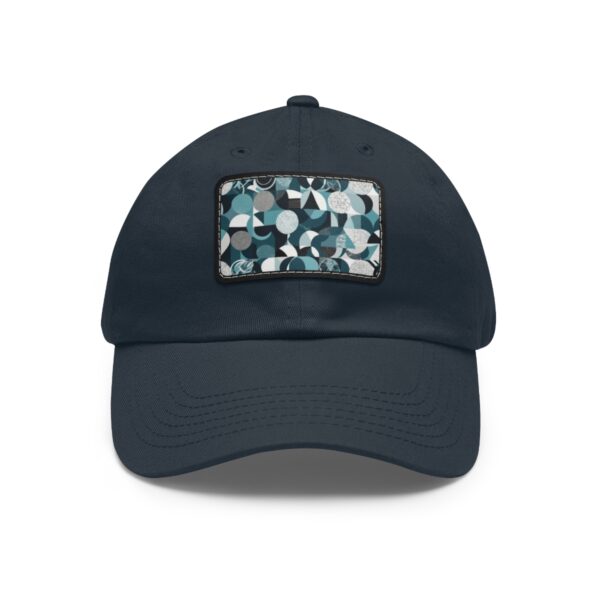 Dad Hat with stitched patch featuring a bold abstract pattern of overlapping circles in various shades of blue, white, and gray.