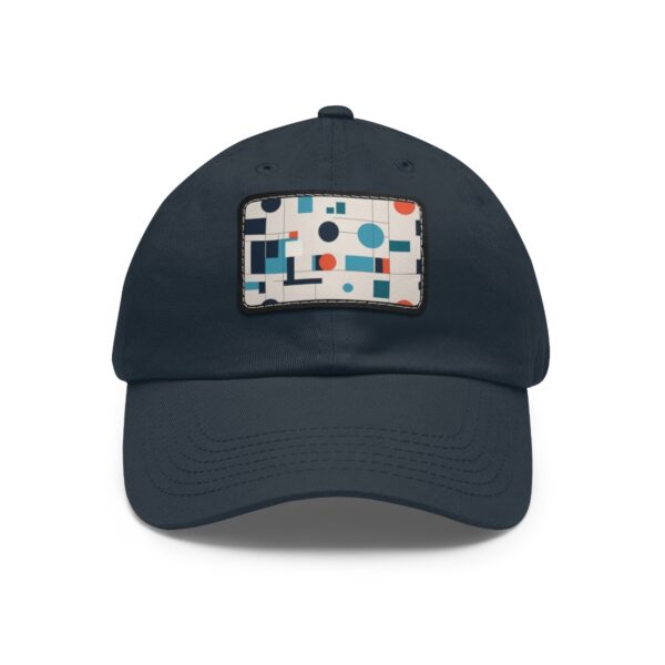 Dad Hat with stitched patch featuring a modern abstract pattern of circles and rectangles in blue, red, and black.