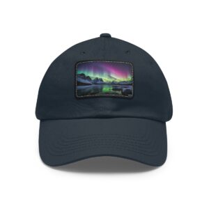 Dad Hat with rectangular patch featuring Northern Lights reflecting over a snowy Arctic landscape