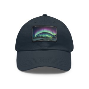 Dad Hat with rectangular patch showcasing a vibrant Northern Lights arc over a serene Arctic landscape