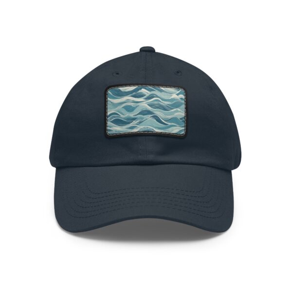 Dad Hat with stitched patch featuring a wavy abstract pattern in various shades of blue.