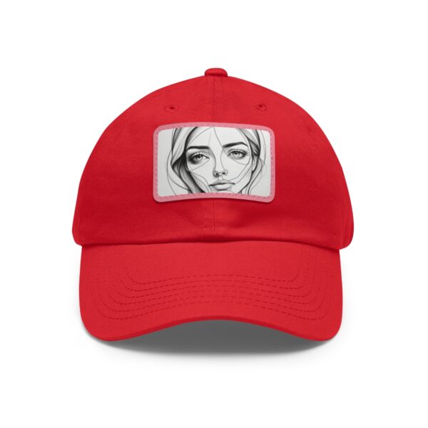 Dad Hat with rectangular patch featuring a minimalist line drawing of a woman's face with expressive eyes