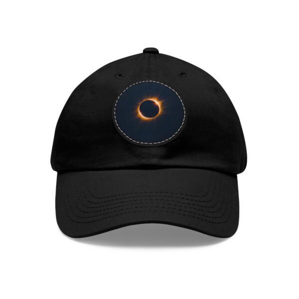 Dad Hat featuring a design of a solar eclipse with a glowing orange ring on front