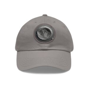 Dad Hat with round patch featuring a close-up image of the Moon's surface with detailed craters