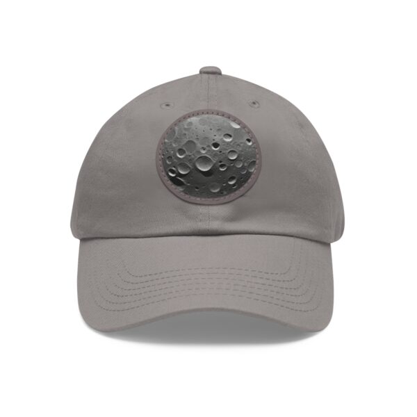 Dad Hat with round patch featuring a textured image of the Moon's surface with detailed craters