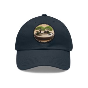 Dad Hat with a detailed bonsai tree and zen garden landscape design on the front