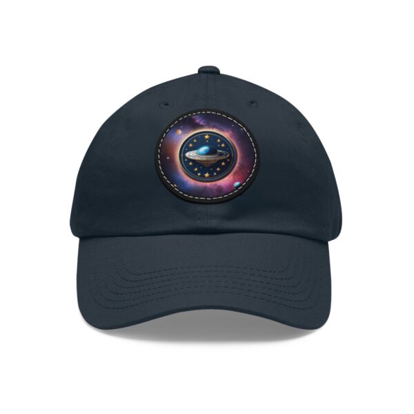 Dad Hat with round patch featuring a UFO surrounded by stars in a colorful galaxy