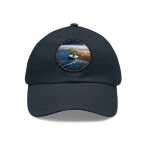 Dad Hat with round patch displaying an artistic representation of satellites orbiting Earth with a colorful view of the planet