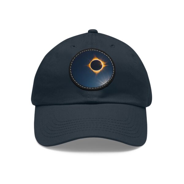 Dad Hat featuring a design of a solar eclipse with a glowing ring of light on front