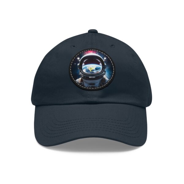 Dad Hat featuring a design of an astronaut's helmet with a view of Earth and space on front