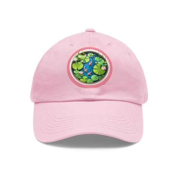 Dad Hat with a vibrant koi pond design featuring lily pads, flowers, and fish on the front