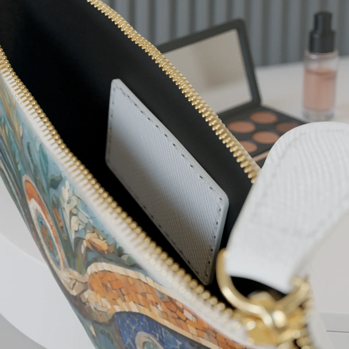 Close-up of the inside of the mini clutch bag with a visible inner pocket and zipper.