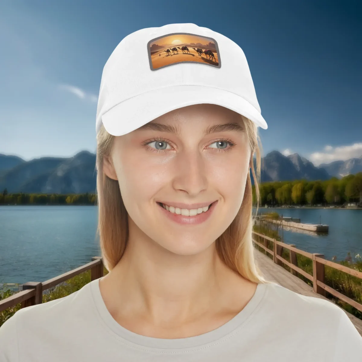 Woman wearing a white baseball cap with camel caravan desert scene patch