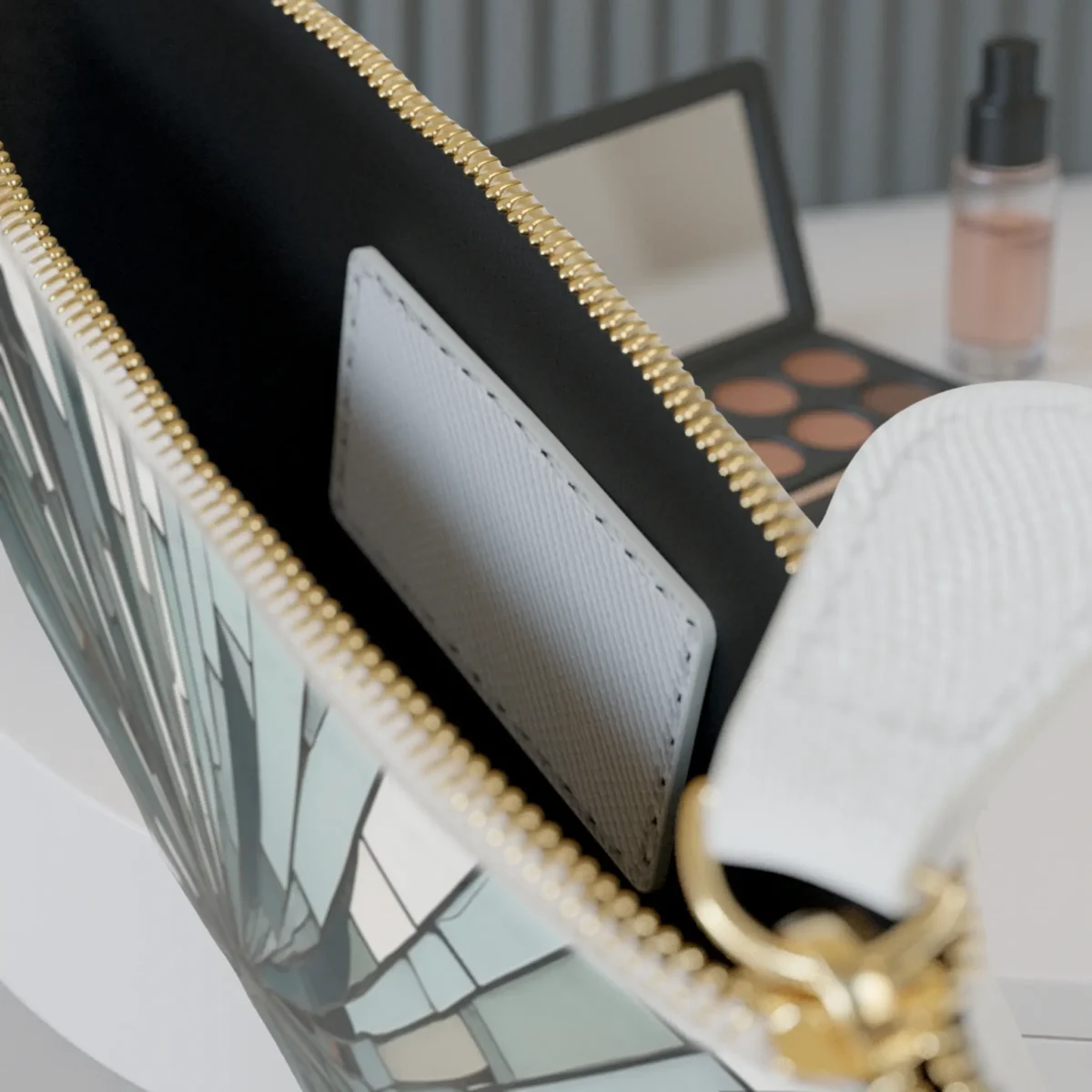 Interior view of mini clutch bag with fragmented mirror design and internal pocket
