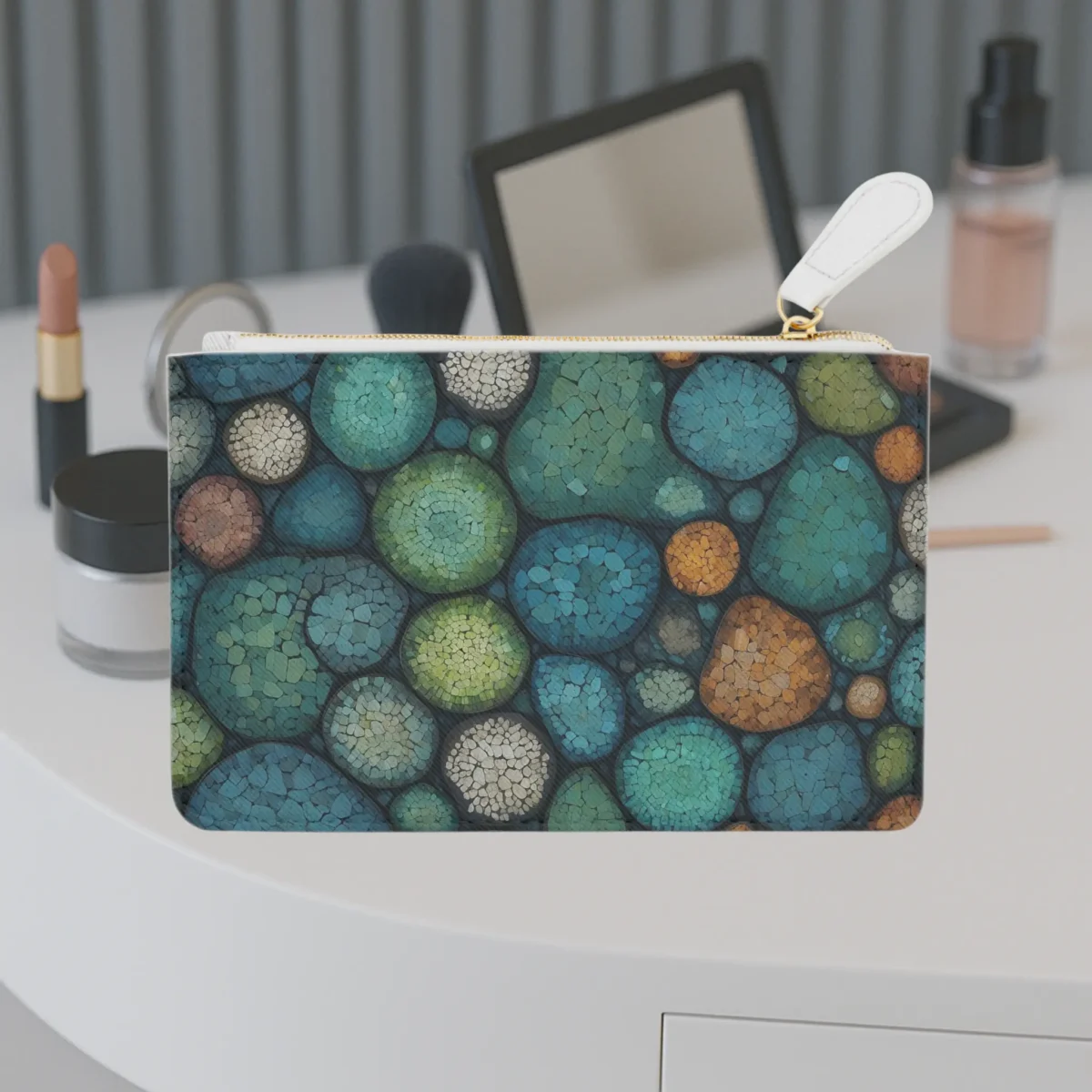 Mini clutch bag with a colorful abstract pattern of overlapping organic circles