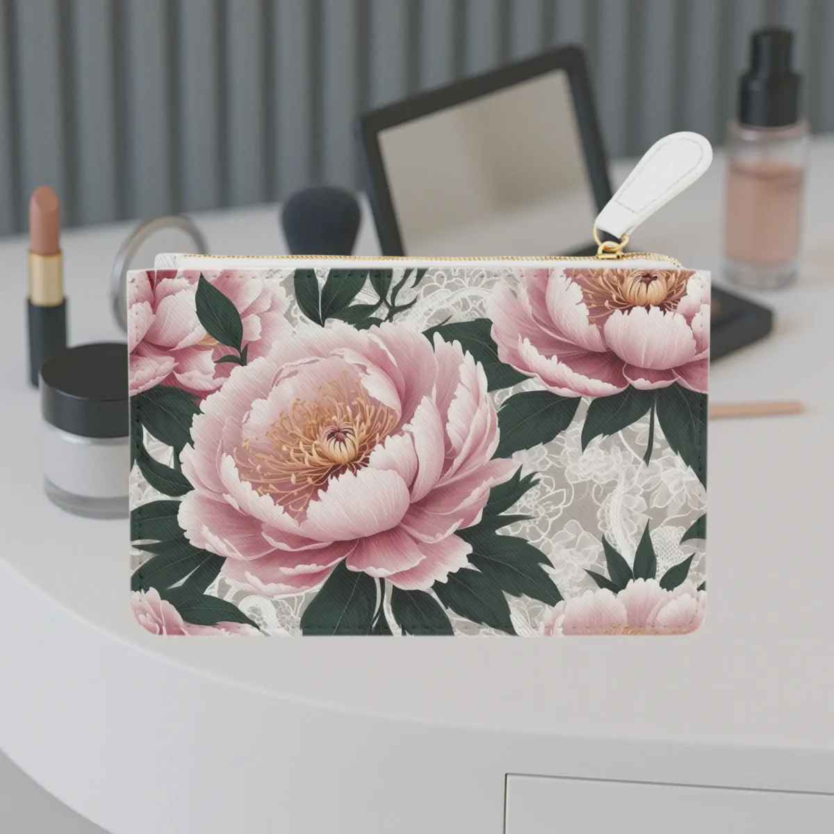 Mini clutch bag with a pink peony floral pattern on a neutral lace-inspired background